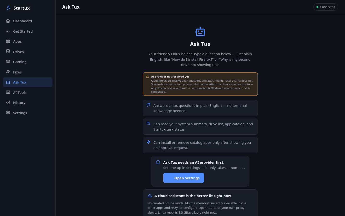 The Ask Tux assistant welcome screen explaining its system summary, drive, catalog and task-status access, its confirmed app actions, and provider setup choices.